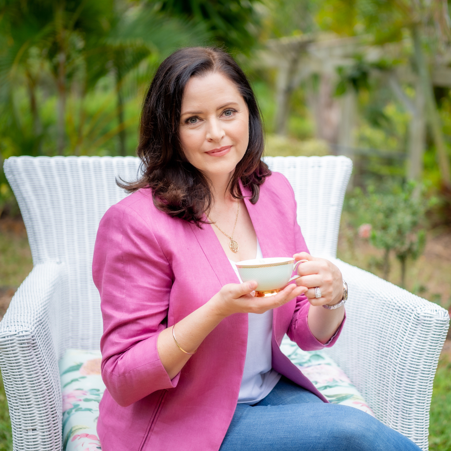 Cassandra Duffill enjoying a cup of herbal tea outdoors Cassandra Duffill enjoying a cup of herbal tea outdoors